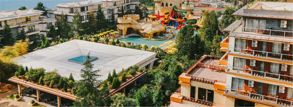 Cinematic aerial view of Dreamland Oasis seafront resort grounds in Chakvi